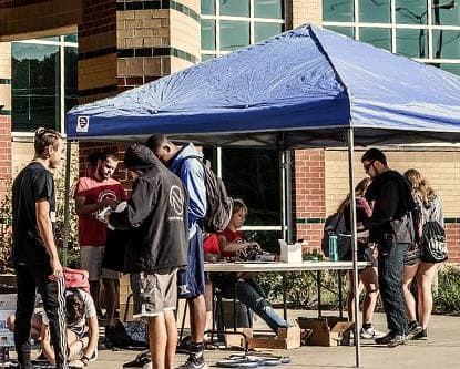 NOVA representatives meeting community members