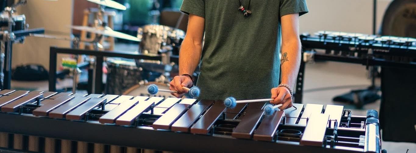 A student rehearsing on a keyboard percussion instrument