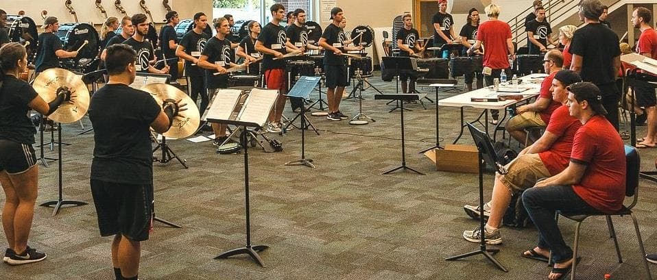 Students taking part in a percussion clinic